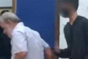 Aluno tenta derrubar professor